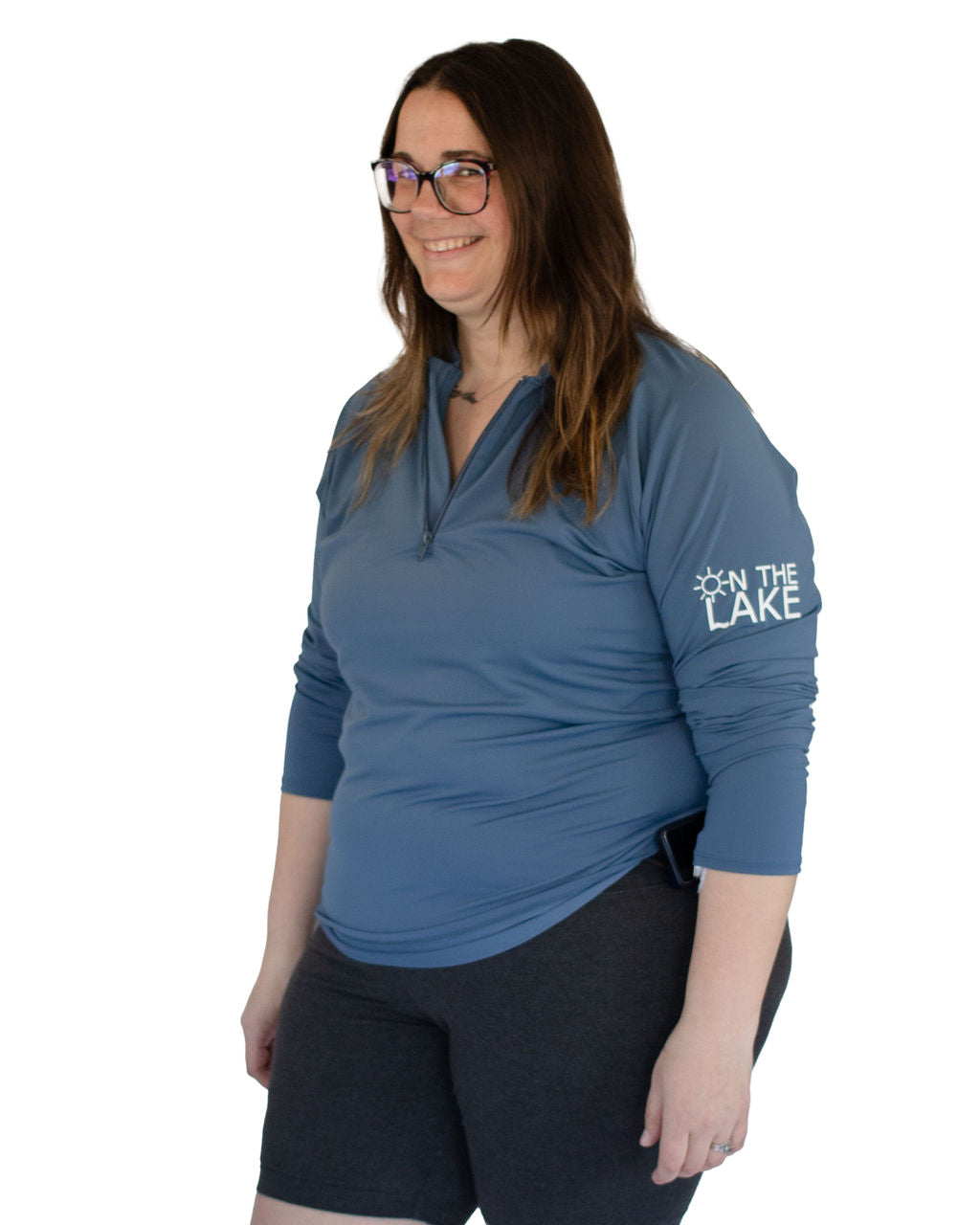Adult UPF 50+ natural sun protection swimwear clothing Canada, UPF 50+ swimwear, Sun protective clothing, UV swimwear, Sun-safe apparel, UV protection for water activities, Sun-blocking swimwear, Family sun protection clothing, Sun safe boating attire, woman fishing in grey blue UPF 50+ shirt