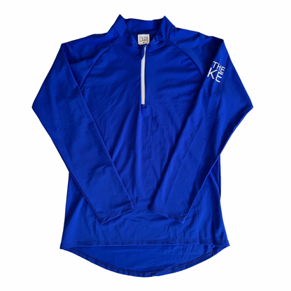 Adult UPF 50+ natural sun protection swimwear clothing Canada, UPF 50+ swimwear, Sun protective clothing, UV swimwear, Sun-safe apparel, UV protection for water activities, Sun-blocking swimwear, Family sun protection clothing, Sun safe boating attire, woman fishing in royal blue UPF 50+ shirt