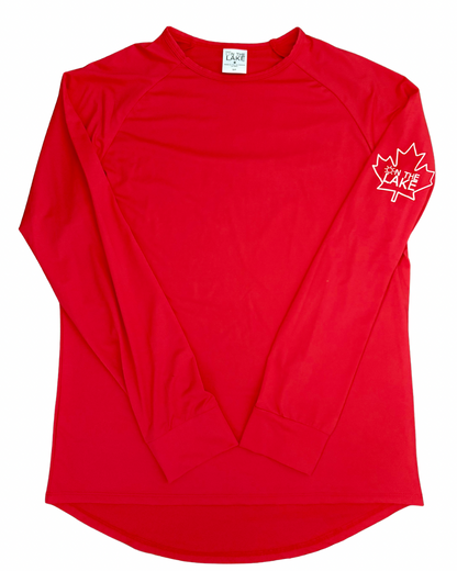 Women/Men's bright red UPF 50+ sun protection long sleeve shirt, front view with "On The Lake" inside a maple leaf logo on the upper left sleeve, for fishing, boating, and outdoor summer wear